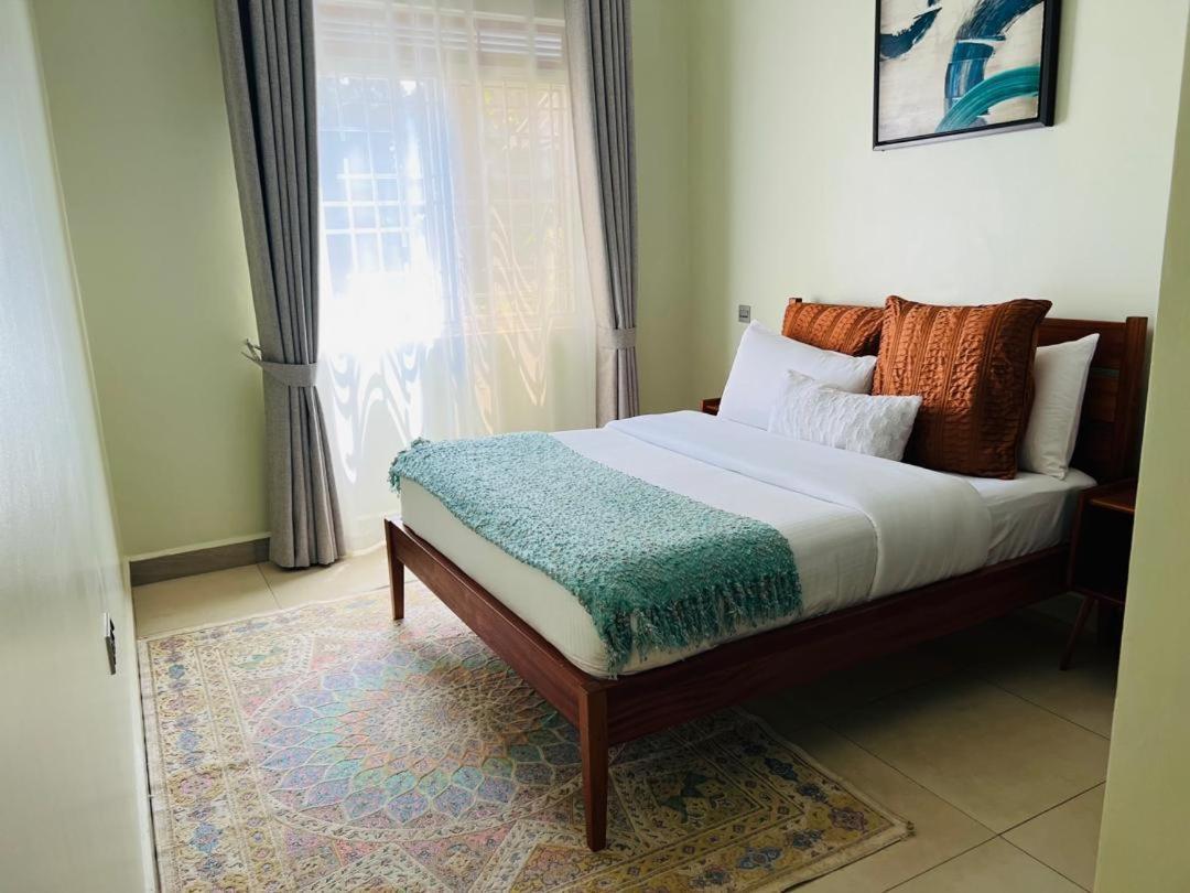 Alsander Homes Peach Bweyogerere Exterior foto
